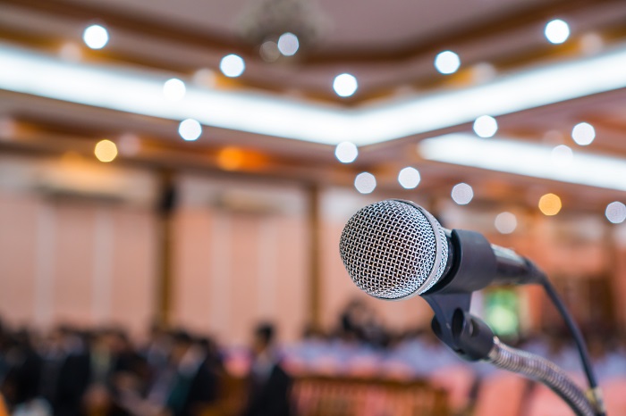 Microphone abstract prepare for speaker speech of conference or seminar hall at exhibition room background. Business Talk Presentation concept