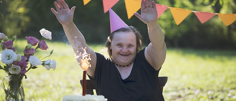 Lady with down's syndrome celebrating her birthday