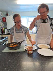 People on a cookery course