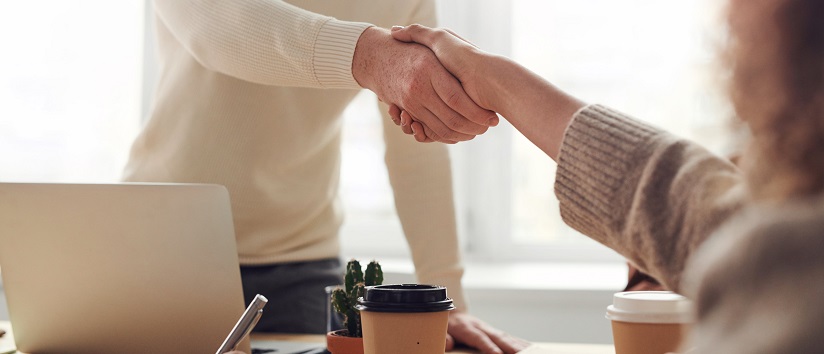 Job interview - man shaking hands with a candidate