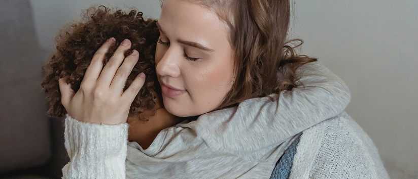 mother and child hugging