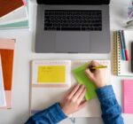Woman making notes on the desk